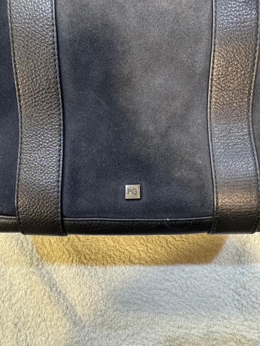 Mala azul escura da Purificacion Garcia