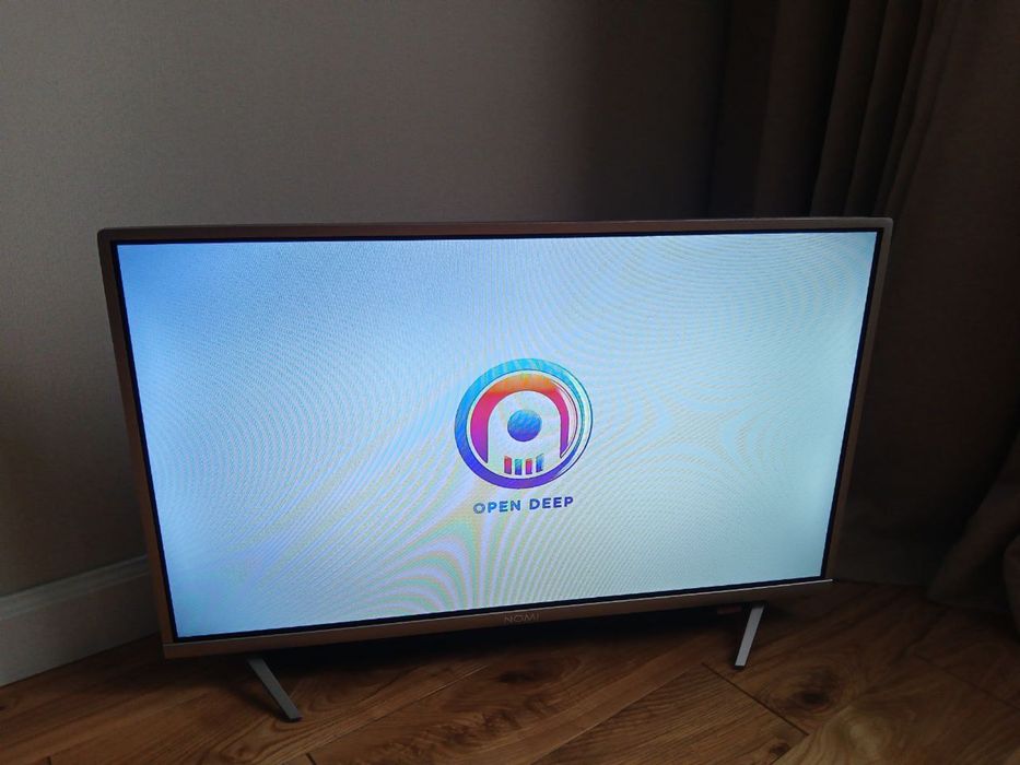 Продам комплект: телевізор Nomi + тюнер