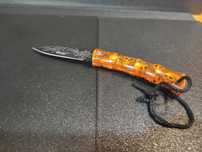Nóż składany 18cm długości w czaszki