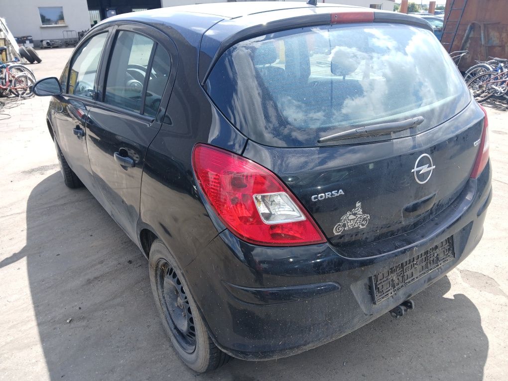 Opel Corsa d maska I inne 1.3