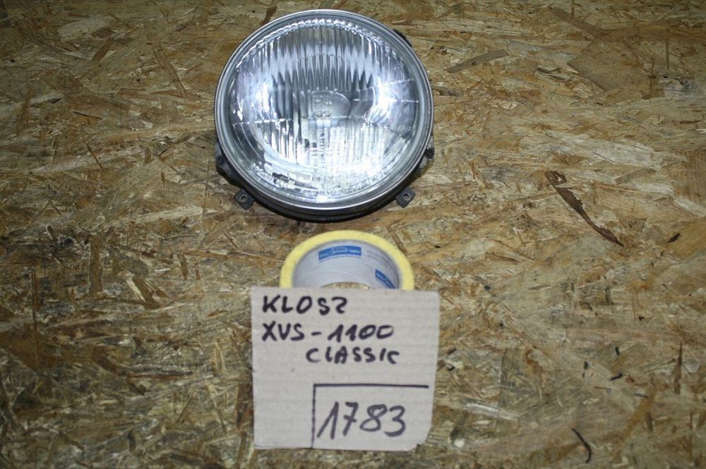 KLOSZ LAMPA HELLA 1A6 002 359-03 MAZDA 323