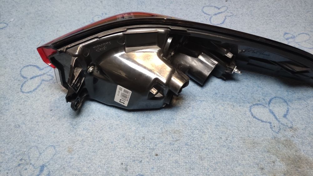 Lampa tylna lewa Toyota Corolla E21 18-23