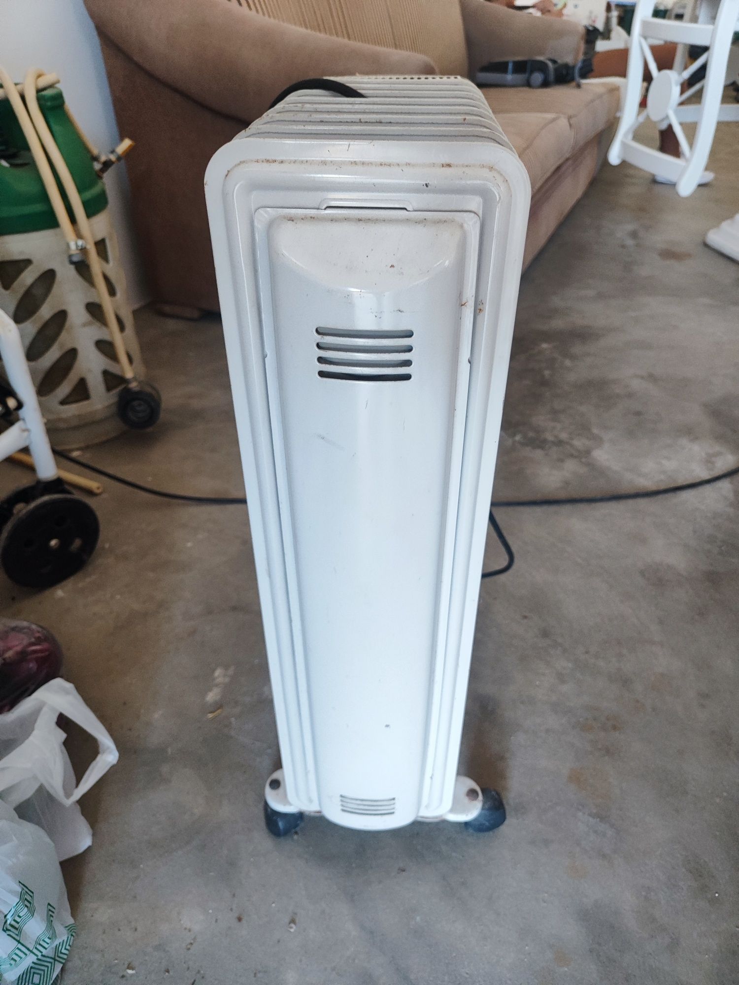 Aquecedor a óleo Solac sem ficha. Fio eléctrico cortado