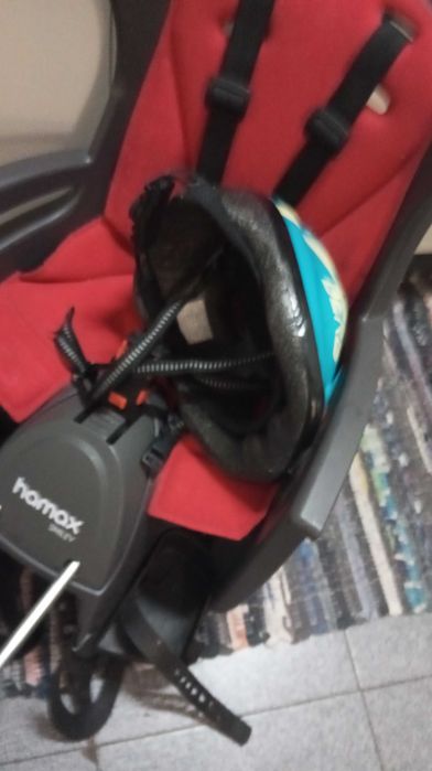 Cadeirinha de bicicleta incluso o capacete em ótimo estado de uso