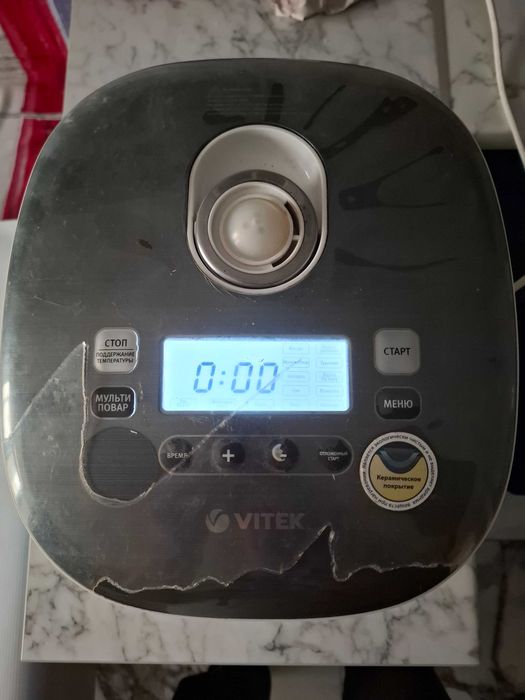 Мультиварка Vitek VT-4213 GY та Мультиварка Vilgrand VMC286