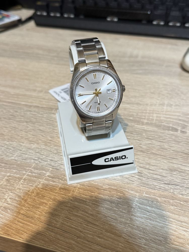 Nowy Zegarek Casio MTP-1302D-7A2VDF metalowa bransoleta