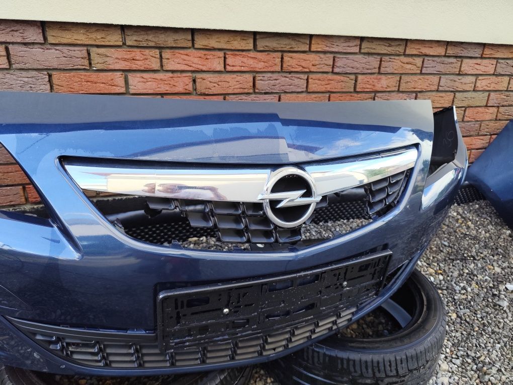 Zderzak skorupa kierunkowskazy opel astra j z22a xenon spryskiwacz