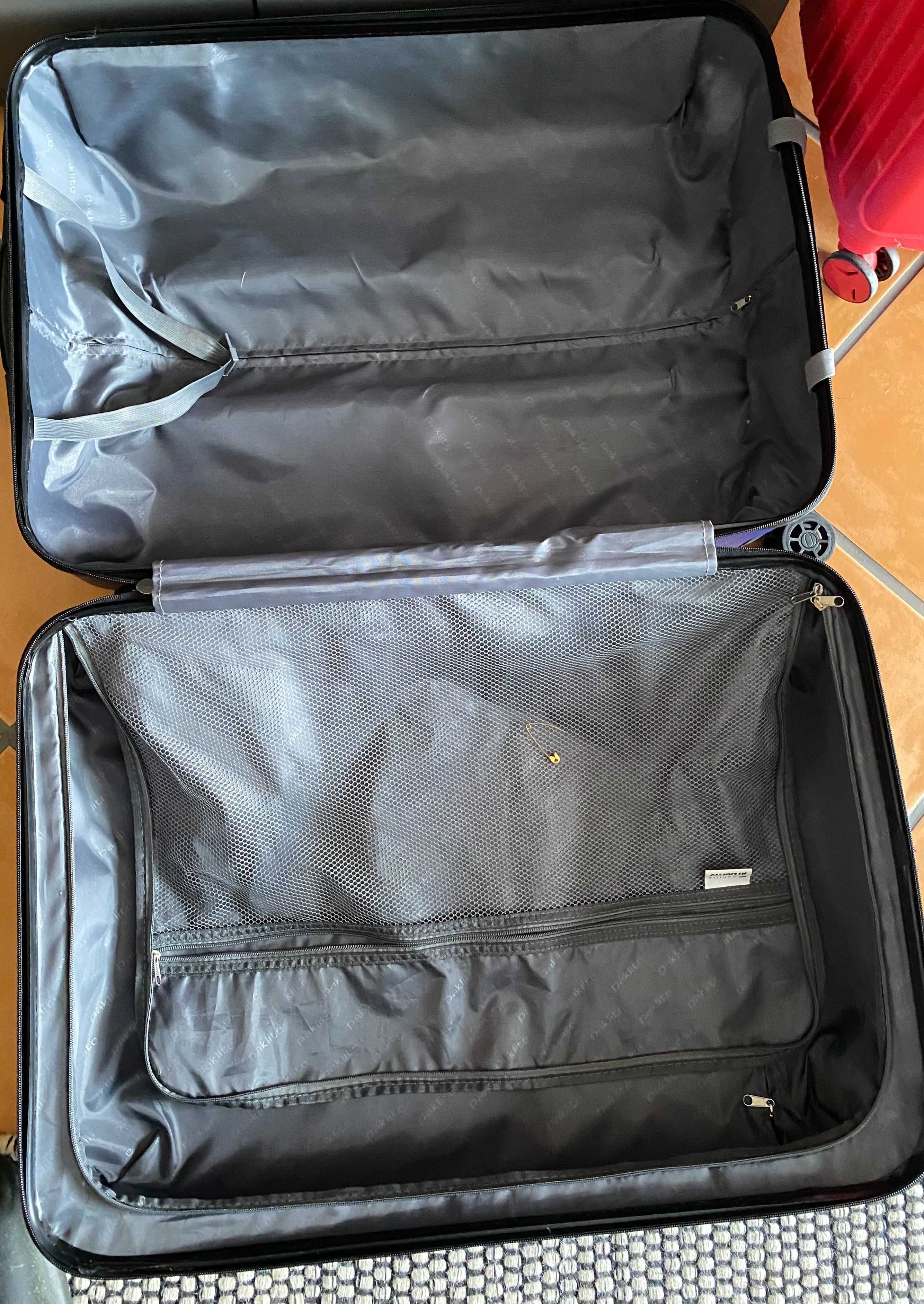 Large blue Paklite travel luggage