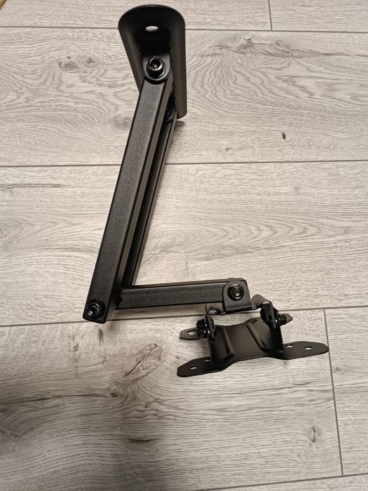 Кріплення для телевізора з поворотом