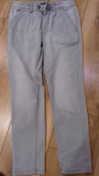 Szare spodnie dżinsy jak nowe Reserved 140