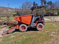 Dumper com pá auto carregante