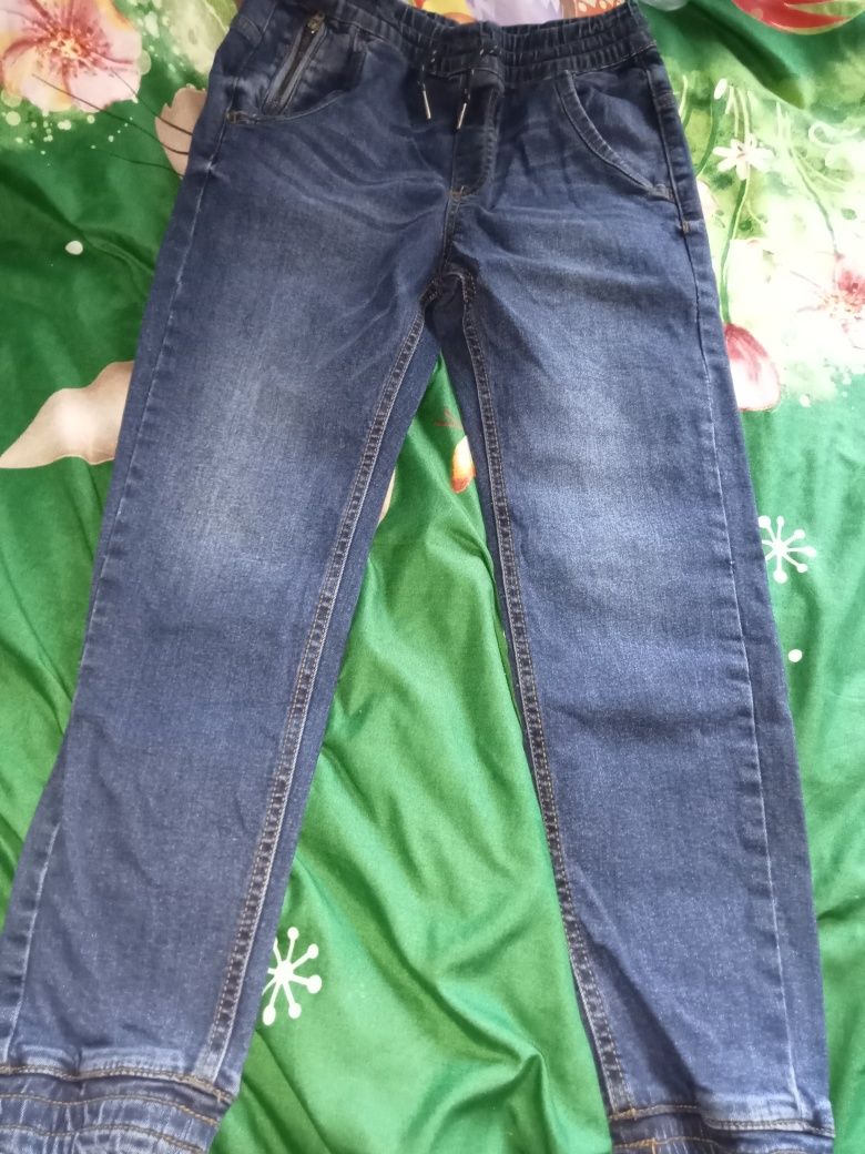 Spodnie jeansy na gumce 140 Reserved młodzieżowe