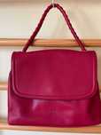 Mala Samsonite de senhora em vermelho: de mão e tiracolo