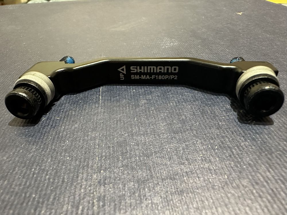 Adapter hamulca tarczowego SHIMANO SM-MA-F180