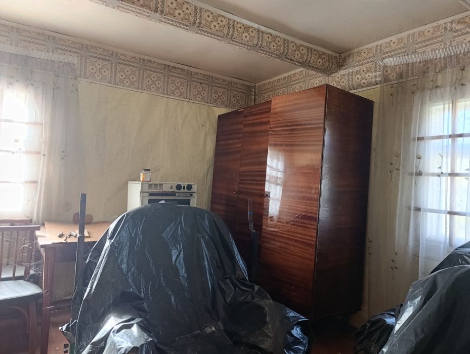 Продам ділянку з будинком