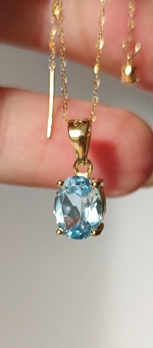 Zawieszka srebro 925 pozłacane z naturalnym błękitnym topazem