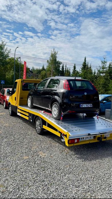 Transport samochodów LAWETA –  WARSZAWA / Kraj i za granicą
