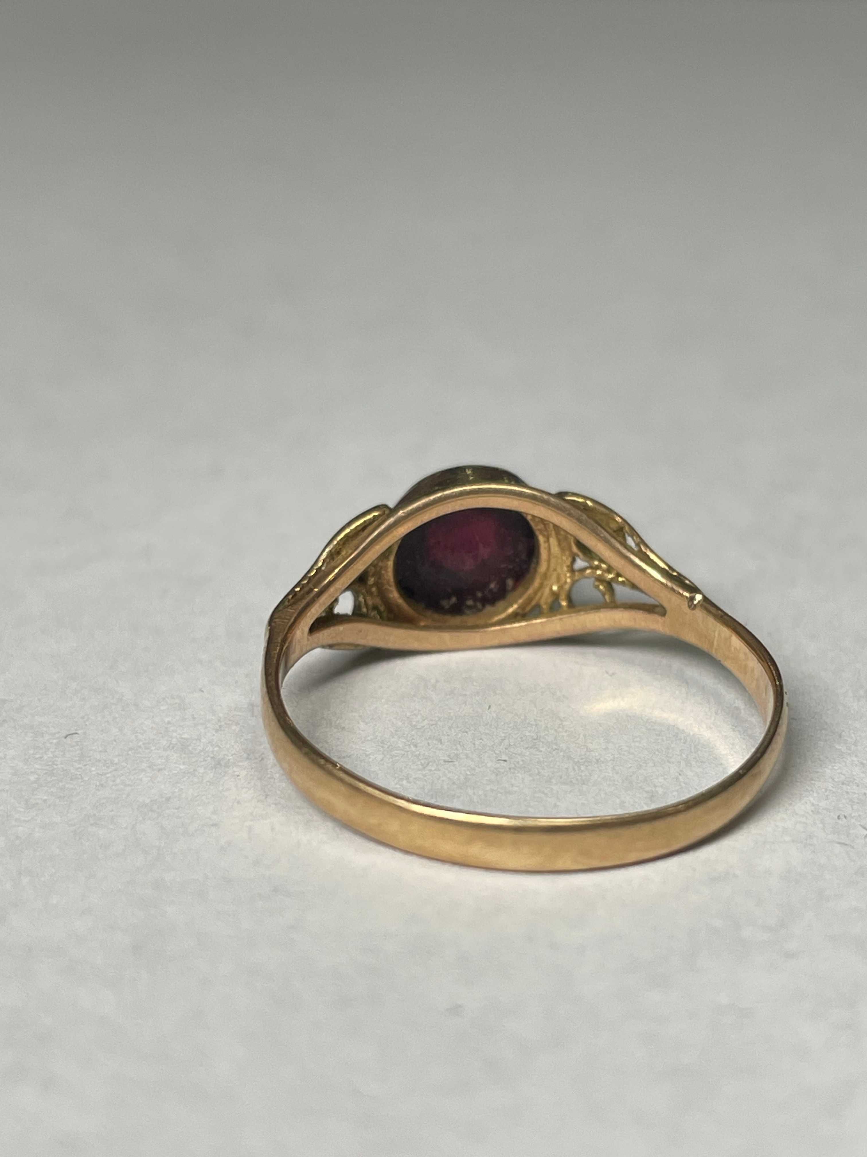 Złoty pierścionek z rubinową cyrkonią 14kt 2,38gram rozmiar 20