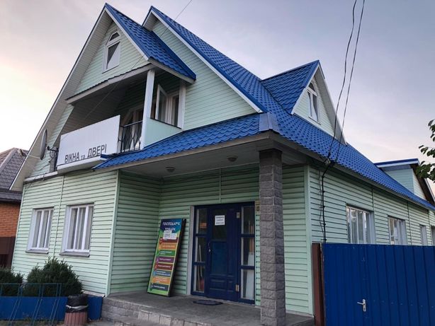 Продам дом+магазин с участком в центре Корюковки