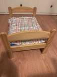 Cama para bonecas