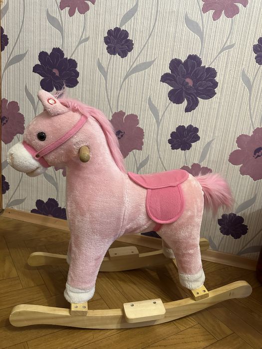 Коник гойдалка музична Рожева