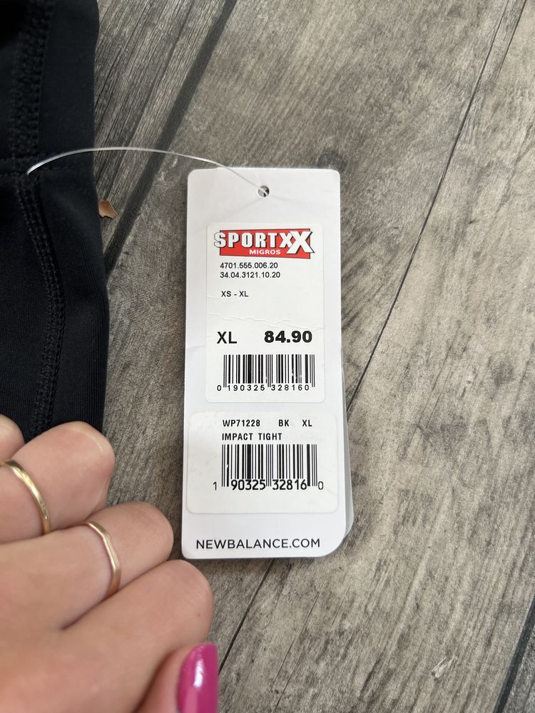 Czarne legginsy new balance
