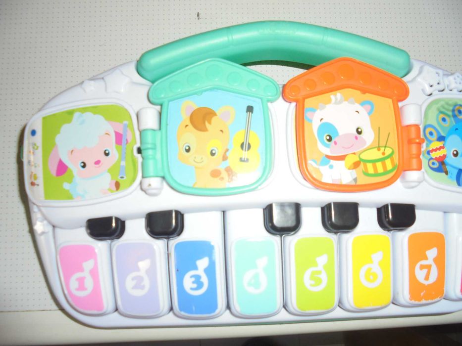 brinquedo para criança o piano com som