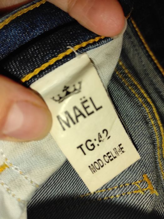 Нові класичні сині джинси розмір М