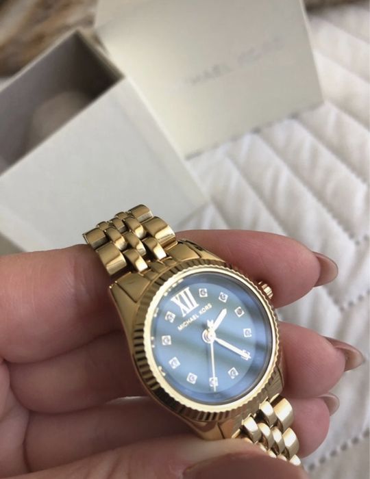 Relógio dourado Michael Kors