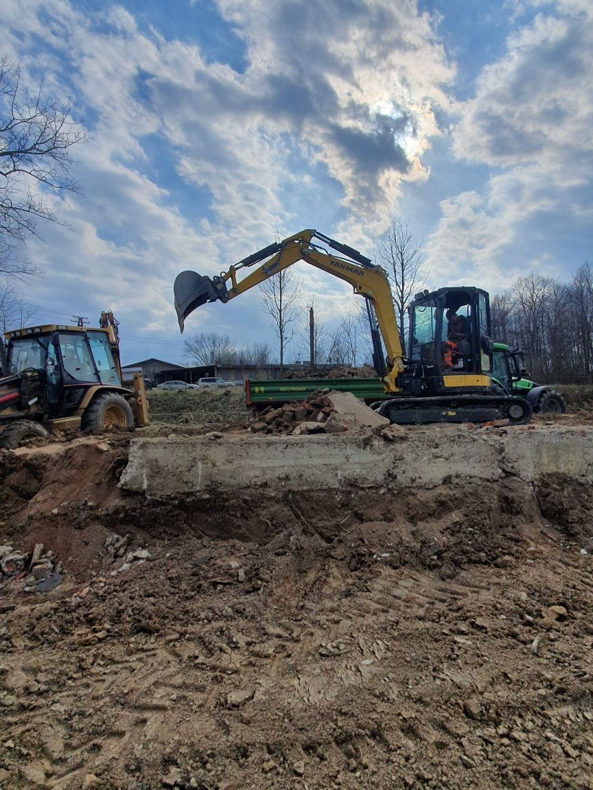 Usługi Koparką ładowarķą minikoparką wyburzenia niwelacja wiercenie