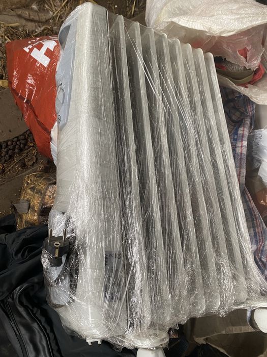 Маслянный обогреватель