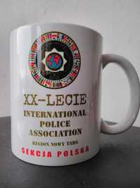 XX-Lecie International Police kubek