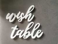 Napis wish table na stół z księgą gości