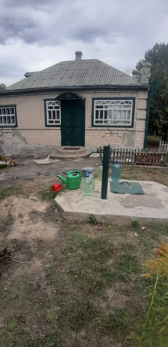 Капітальний будинок.Широка фасадна частина .Яворницьке