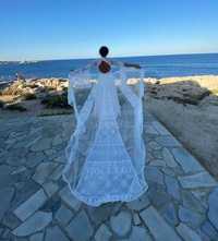 Suknia ślubna w stylu Boho z trenem