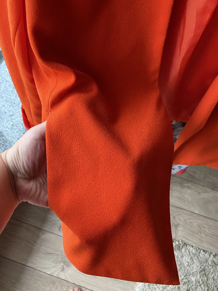 Оранжевий жакет