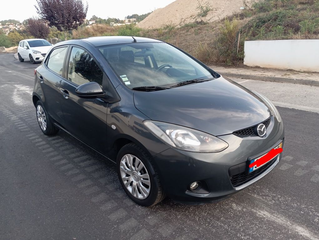 Mazda 2 1.3 gasolina 160mil KMS reais com AC 2010