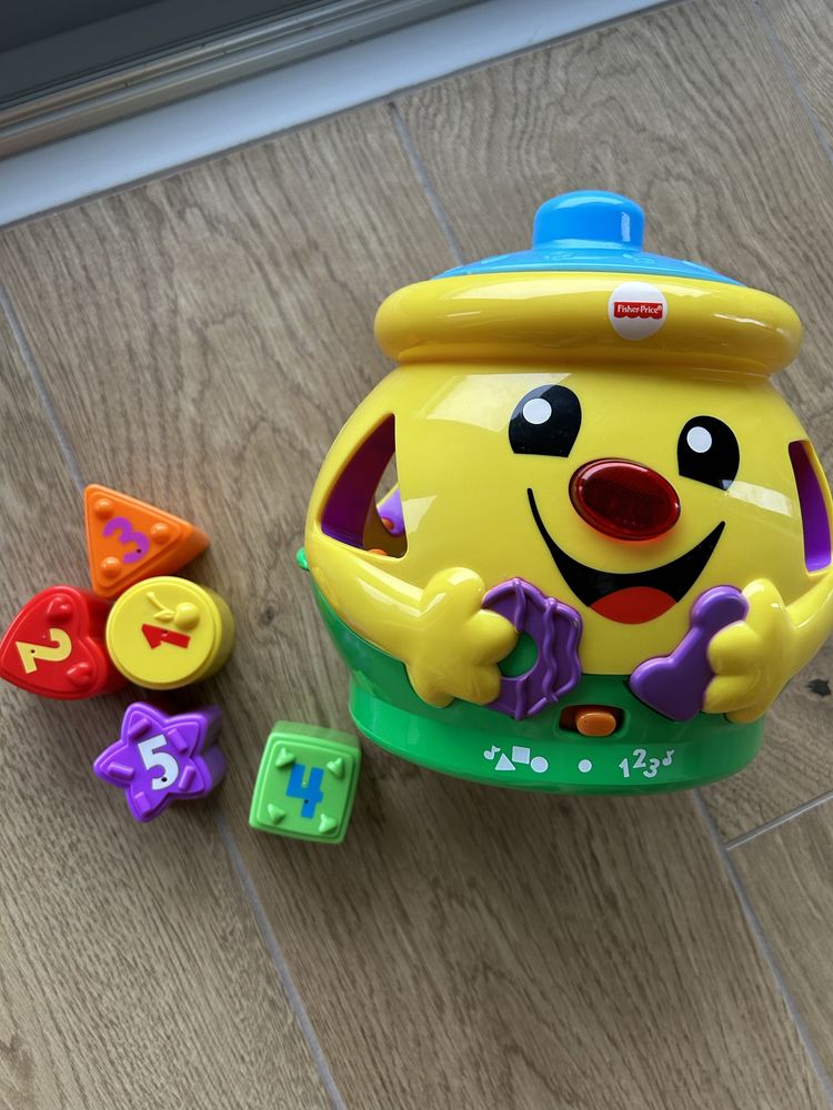 Fisher price garnuszek na klocuszek sorter