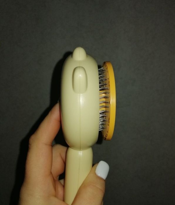 Пуходерка с кнопкой для вычесывания