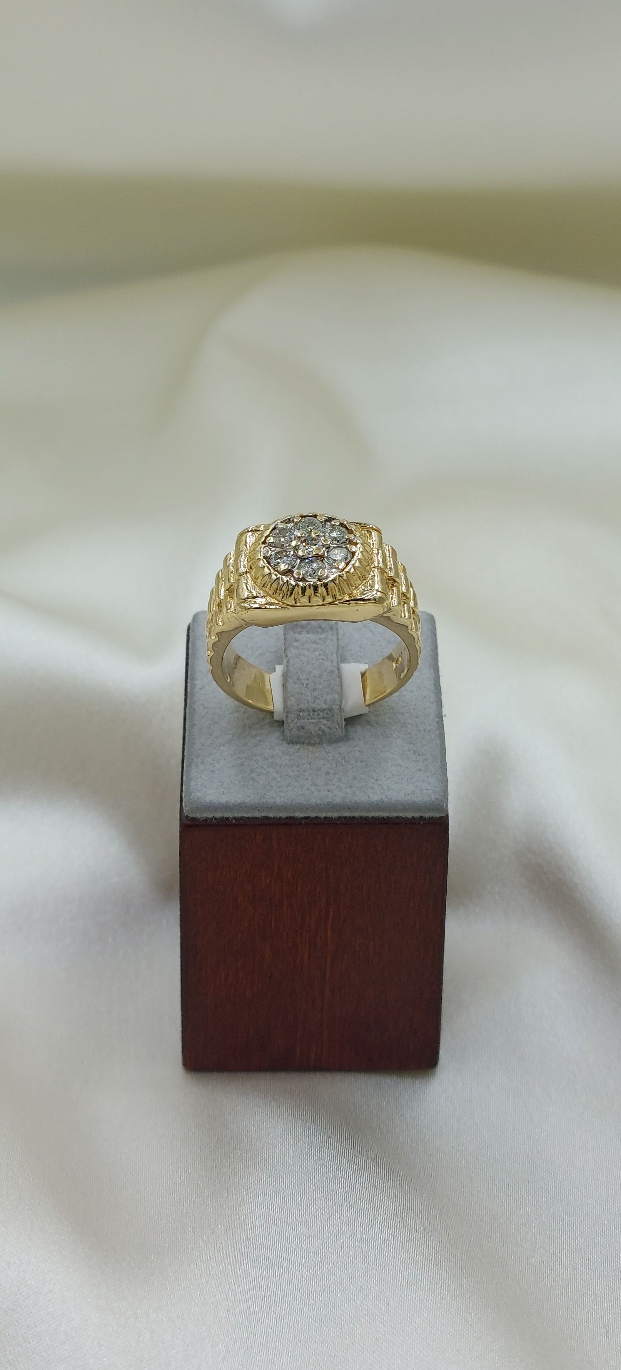 Złoty sygnet  Rolex z diamentami (brylantami).