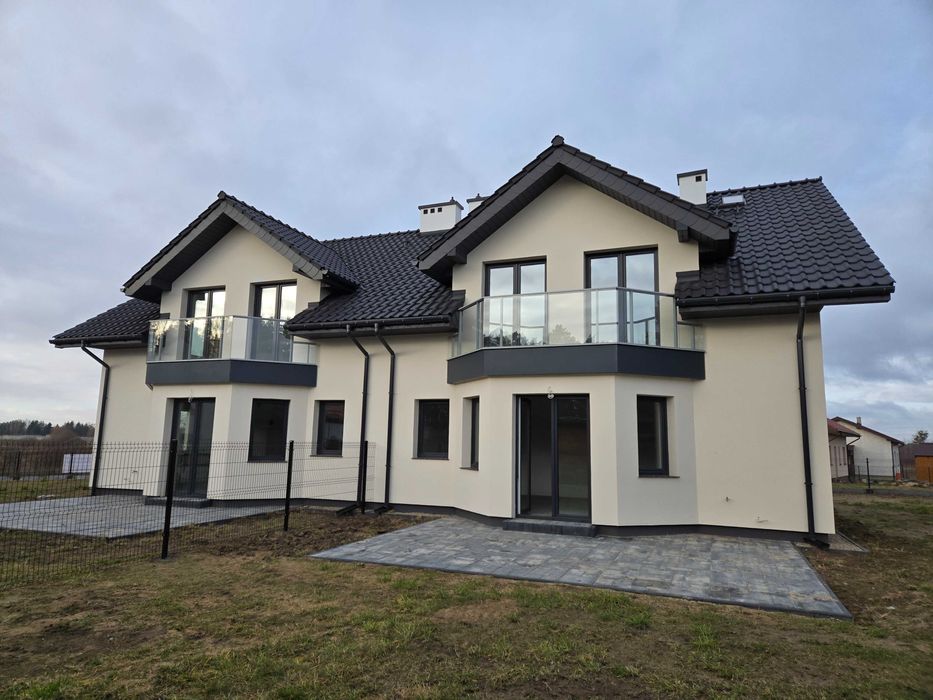 Dom (lewy)w zabudowie Bliźniaczej