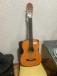 Guitarra classica 3/4 com capa e palhetas