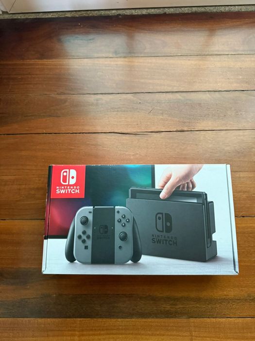 Nintendo switch + jogo + bolsas + película + cartão de memoria