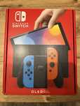 Nintendo Switch OLED + NeoGrip Skull & Co. + etui