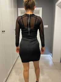 Czarna sukienka mimo