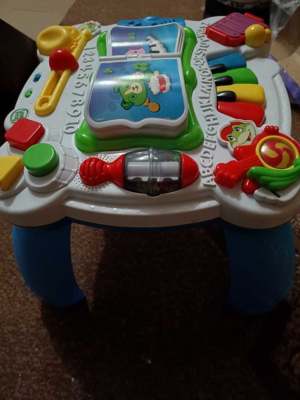 Музична іграшка Чехарда,столик для розвитку дитини