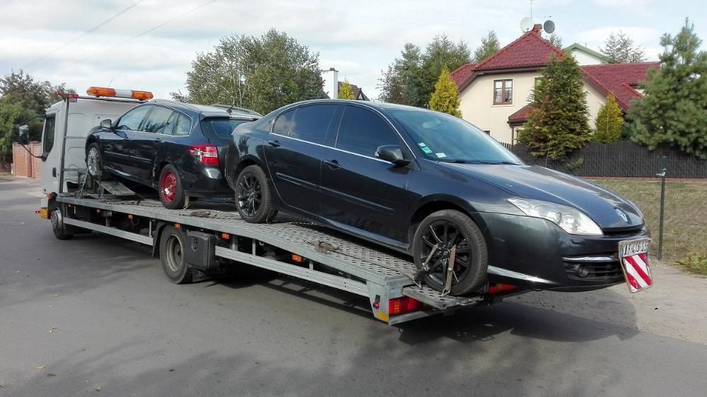 pomoc drogowa laweta transport koparka bus widlak przyczepa kontener