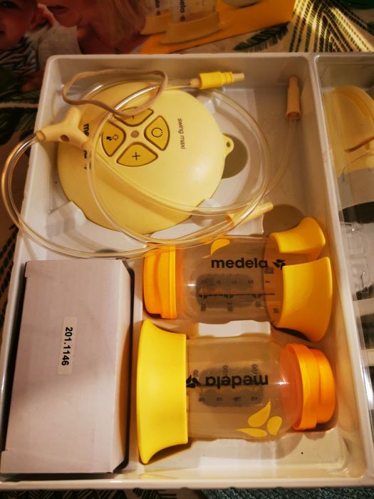 Laktator medela maxi swing flex