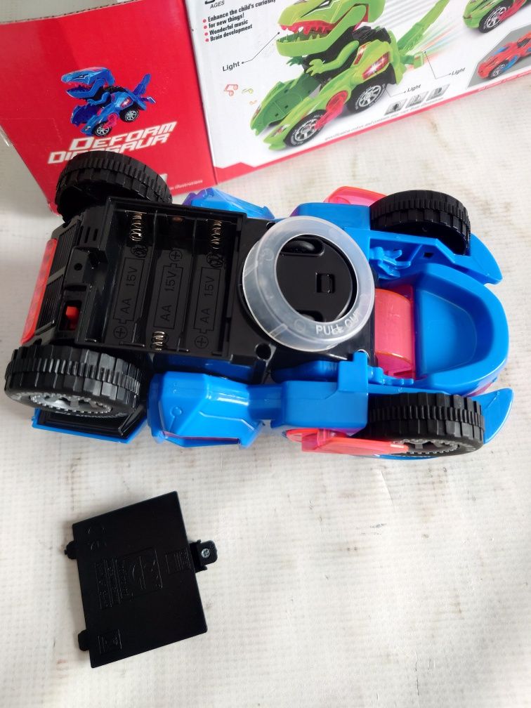 Samochód Dinozaur autko świecące na baterie Transformer wiek 3+