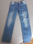 Jeansy z dziurami chlopak 140